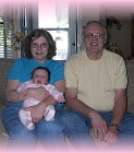 Grandma K & Grandpa E with Caylee-border